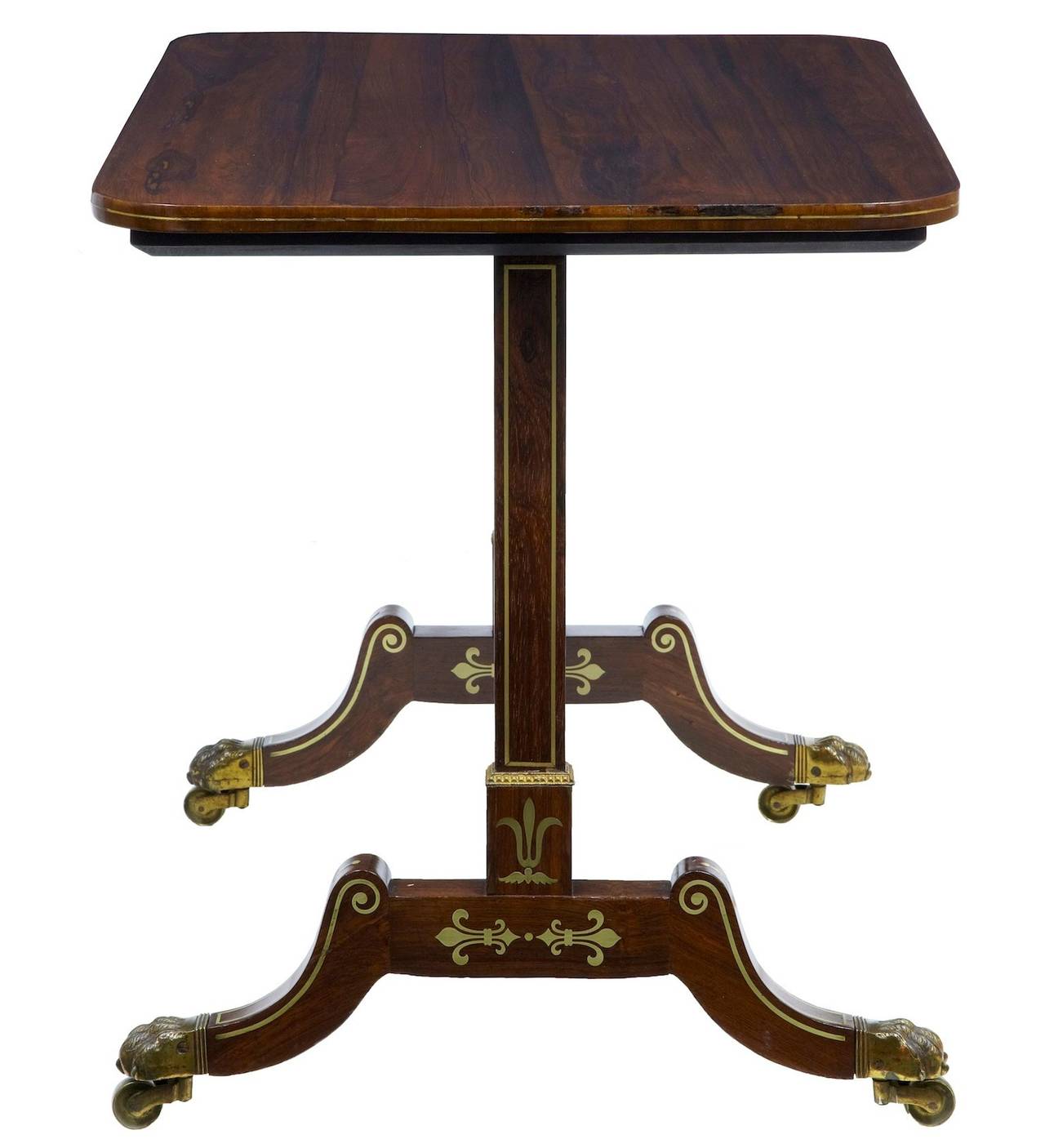 Top quality table in stunning condition, circa 1820. 

Fine quality Regency table in original condition, beautifully inlaid with fleur-de-lys motifs. Standing on original hairy paw feet and castors.

Measures: Height 28
