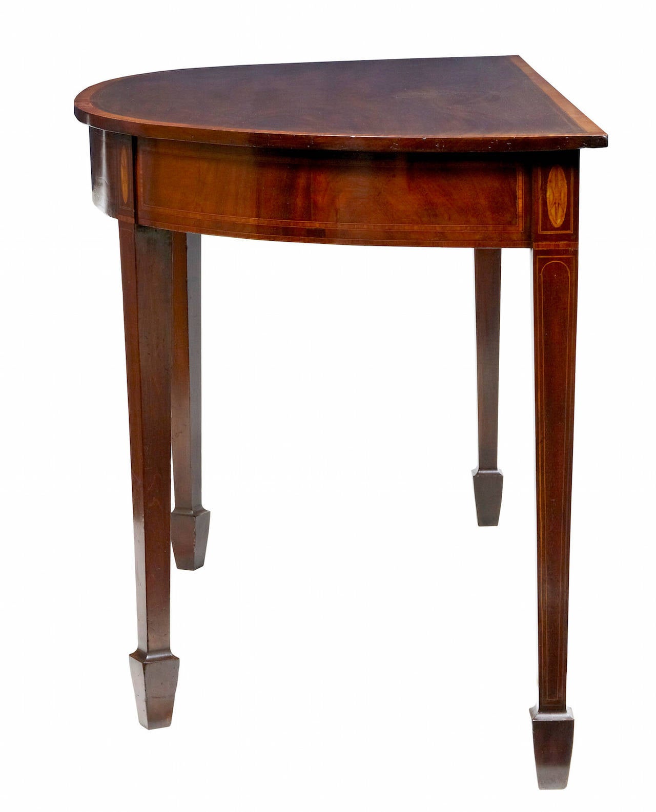 Fine serving table of good proportions circa 1895. 

Strung with salt and pepper stringing and satinwood. 4 tapering legs terminating on spade feet.

HEIGHT: 35