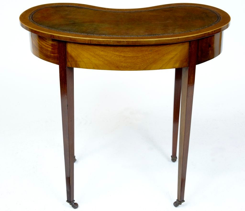 kidney shaped writing desk Product description design, including a unique kidney shaped desk made with hardwood solids. kidney shaped writing desk Product description design, including a unique kidney shaped desk made with hardwood solids.