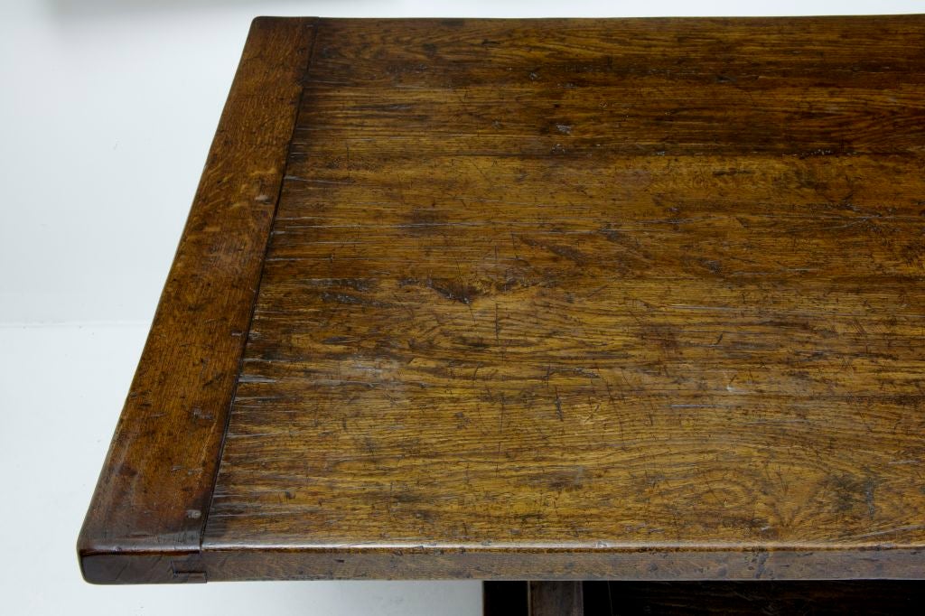 LARGE ENGLISH MADE OAK TRESTLE REFECTORY TABLE

SUPERB COLOUR AND BEAUTIFULLY ADZED TOP

EASILY SEATS 10

CIRCA 1970