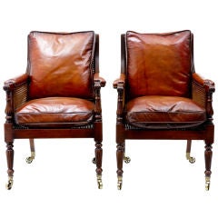 Pair Of 20th Century Regency Influenced Bergere Chairs