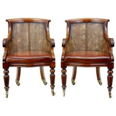 Pair Of Mahogany Regency Influenced Bergere Cane Chairs