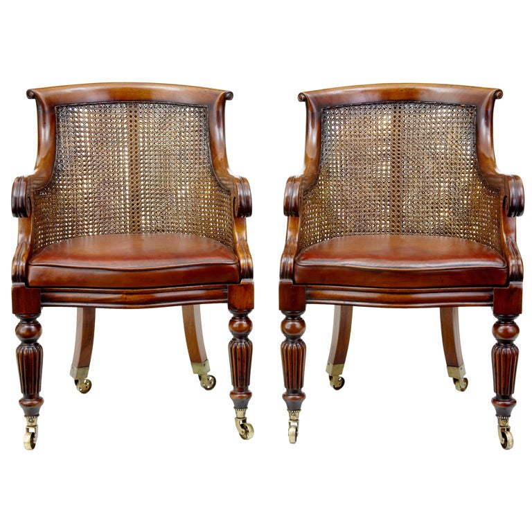 Pair Of Mahogany Regency Influenced Bergere Cane Chairs at 1stDibs