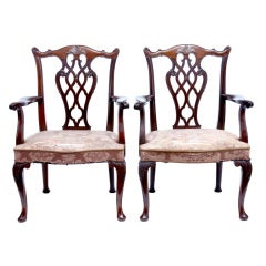 A PAIR OF 1920's SWEDISH CHIPPENDALE MAHOGANY ARMCHAIRS