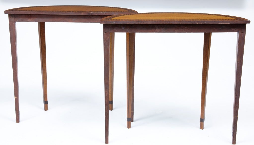 A Pair Of Small Demi Lune Satinwood And Ebony Console Tables