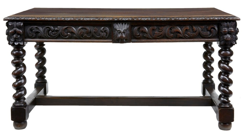 19TH CENTURY ANTIQUE CARVED OAK LIONS HEAD DESK TABLE

BEAUTIFUL TABLE, FEATURING CANDY TWIST LEGS AND CARVED FOLIAGE WITH LION HEADS.

2 DRAWERS

HEIGHT: 30 1/2