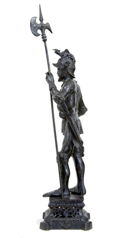 NICE DECORATIVE ITEM OF KNIGHT HOLDING A POLE AXE HALBRED

HEIGHT: 40 1/2