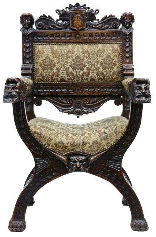 19TH CENTURY ANTIQUE CARVED OAK X FRAME THRONE CHAIR

HEAVILY CARVED VICTORIAN ARMCHAIR, DEPICTING MYTHICAL TYPE HEADS, SLIGHT FABRIC WEAR ON ONE ARM.

HEIGHT: 43