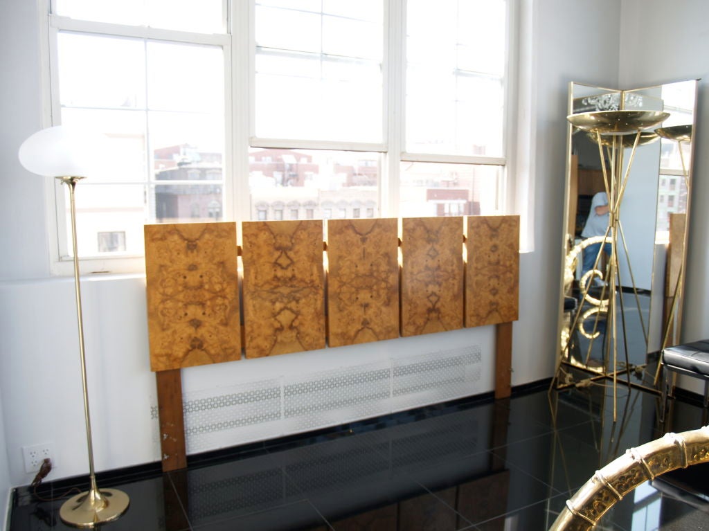 a massive king size headboard from the late 1960's.<br />
the matchbook burl wood is stunning.<br />
the condition is perfect.<br />
have matching mirrors, night stands, dresser and gentlemens high chest as well.