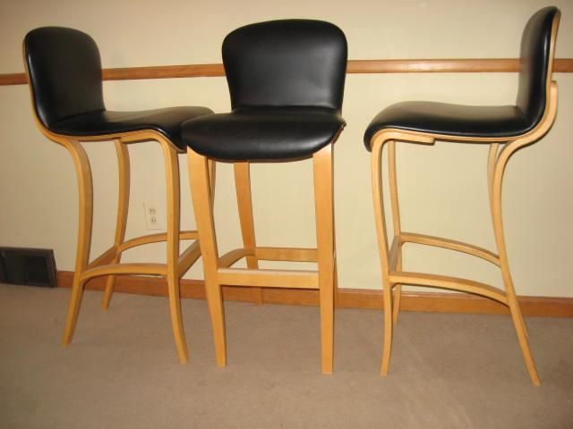 a very nice set of Ply craft bar stools by Lou App dated 1985.

they are in fantastic condition. made from steamed bent maple plywood. the seat are Naugahyde in very nice condition. these are a quite rare set.