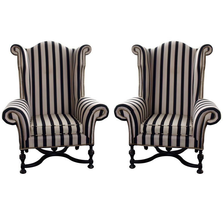 a pair of Mammoth Size wing chairs