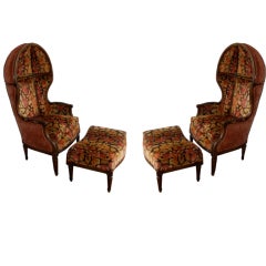 pair of porters chairs with matching foot rests (hooded chairs)