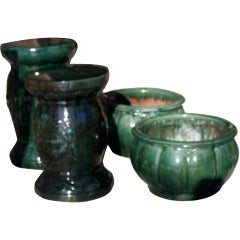 emerald green pottery. urns and garden stools/tables/pedestals