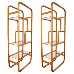 A pair of mid century etageres in a bent plywood
