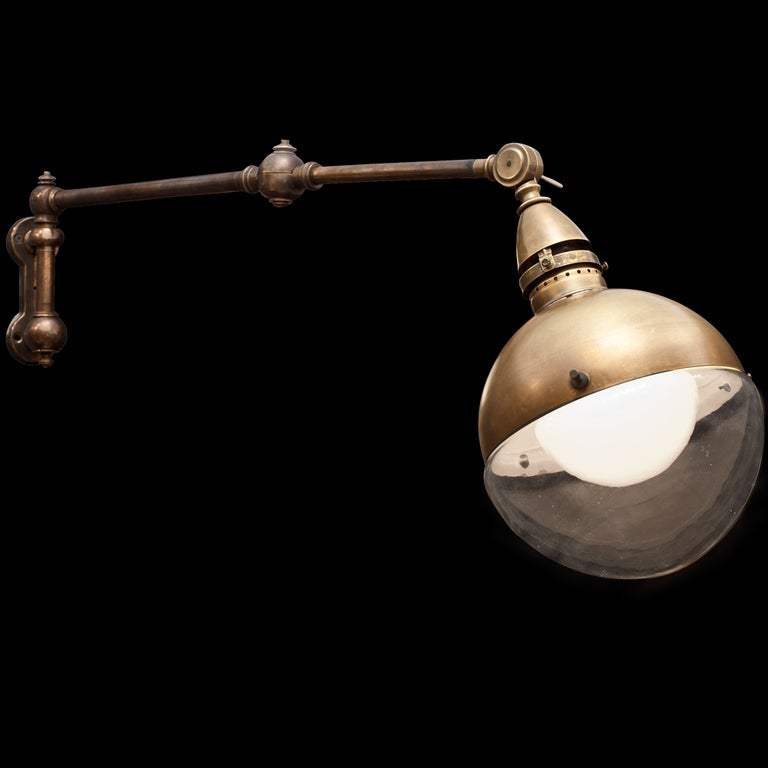 Two Arm Retractable Brass Sconce