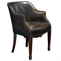 Desk Chair with Worn Black Leather Surface