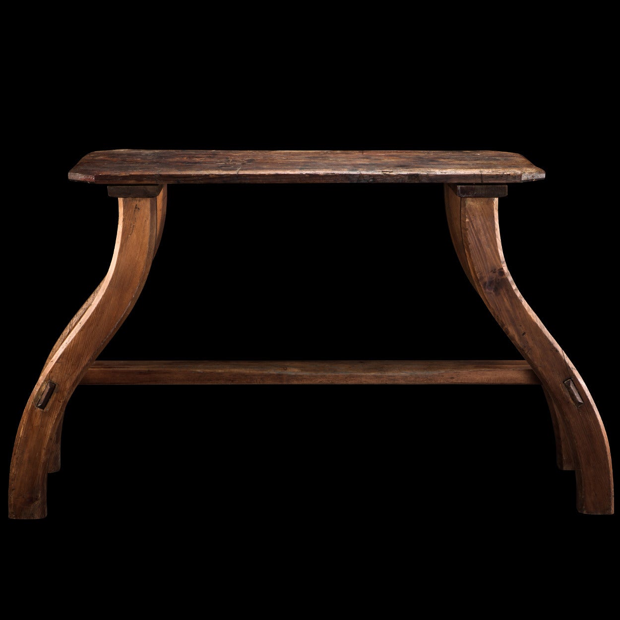Pine bench with simple form.

Made in England, circa 1900.