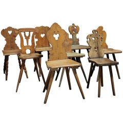Mountain Chairs Each with Unique Hand-Carved Motif
