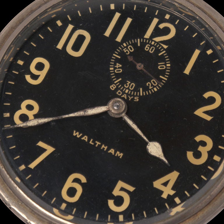 Aircraft control panel clock manufactured by Waltham, 7 jewels.