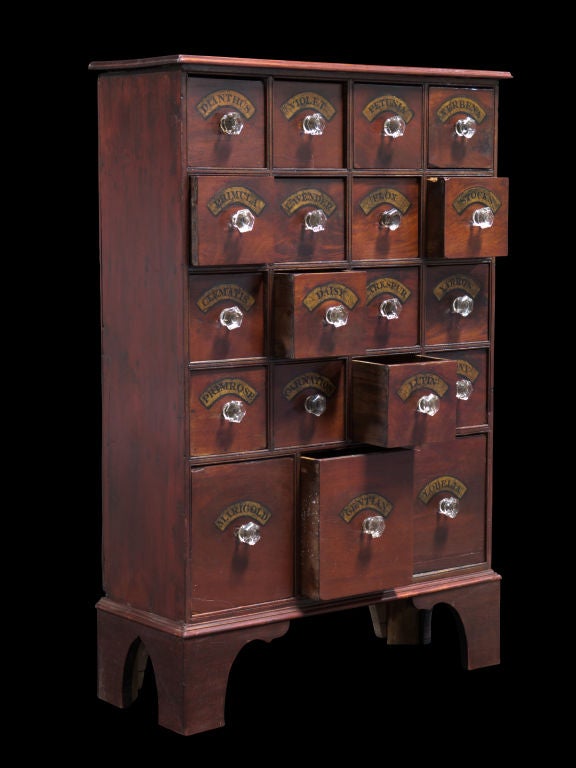 Flower / Seed Bank of Drawers with original glass knobs.