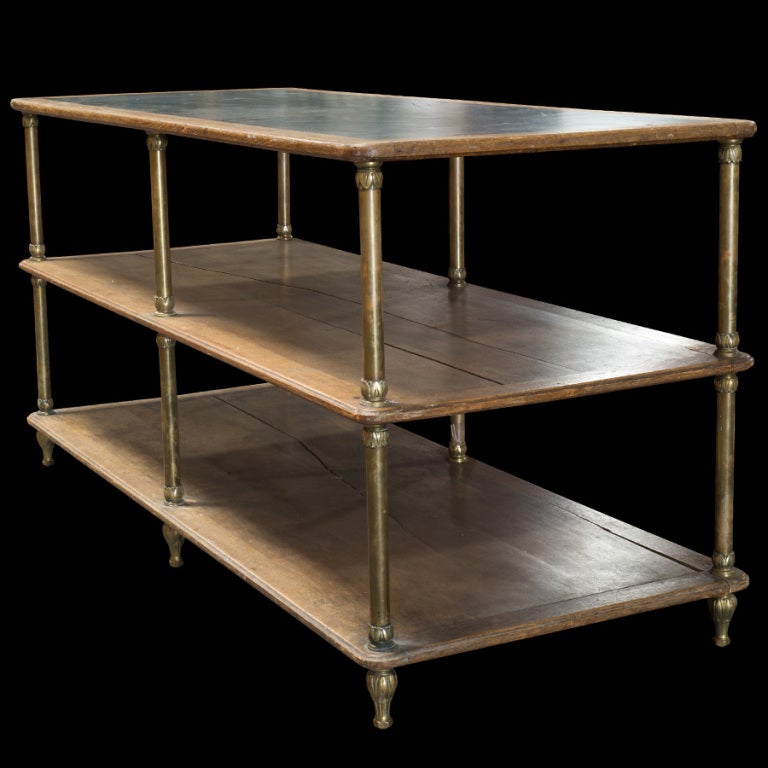 Merchandise Table 
wood, brass, inlaid leather top from 
Galerie Lafayette Dept Store, Paris