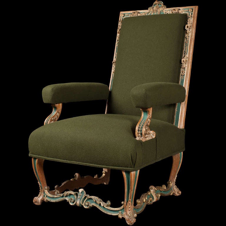Ornate Venetian armchair. reupholstered in green wool fabric with original green and gold painted frame. 

Italy circa 1770.