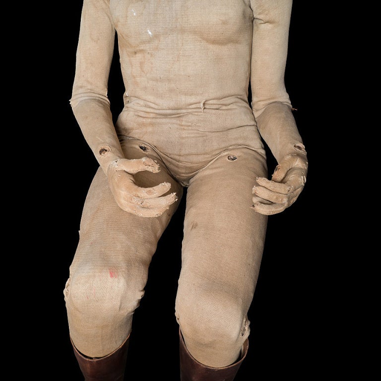 Life-Sized Mannequin / Artist Model with unusual figure with articulated arms, legs, fingers and feet, covered in original jersey. Hand painted paper mache head with glass eyes.