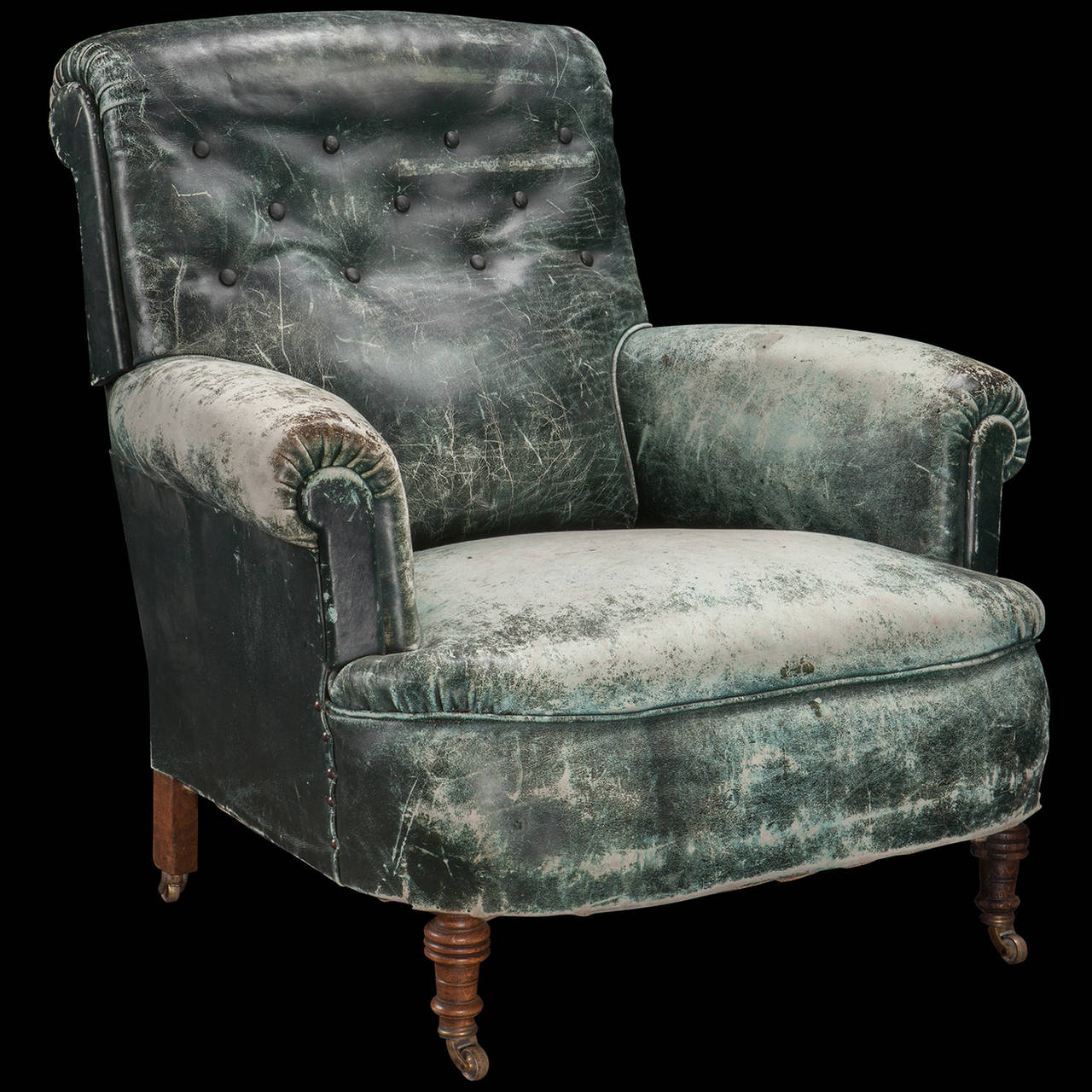 green leather armchairs