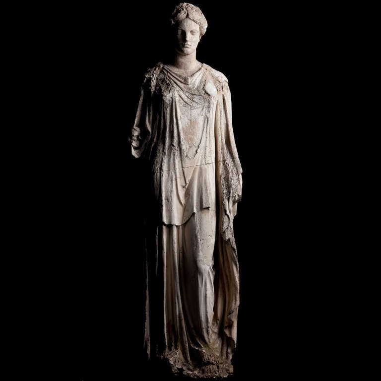 Beautiful garden statue of a roman woman, made of a plaster and stucco composite with incredible patina.

Italy circa 1820.