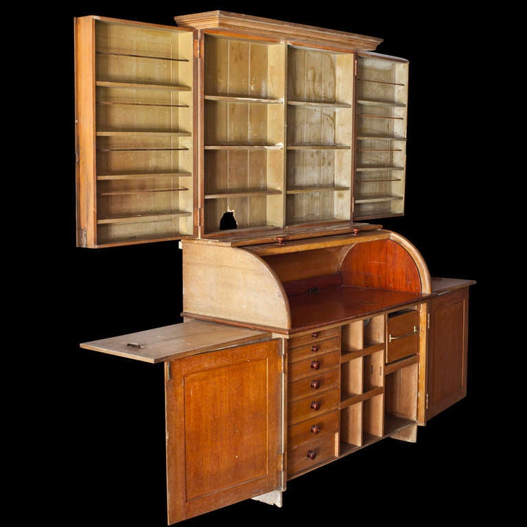 wood cabinet from a British pharmacy used to store medications