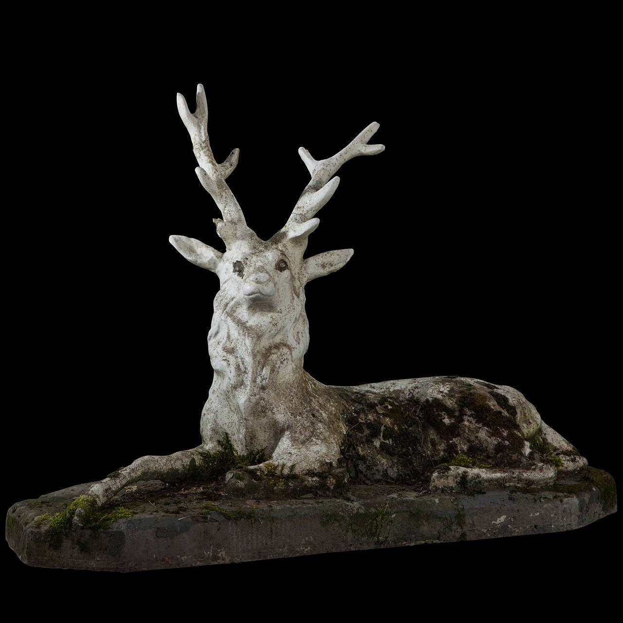 Cast concrete deer statue with wonderful lichen.