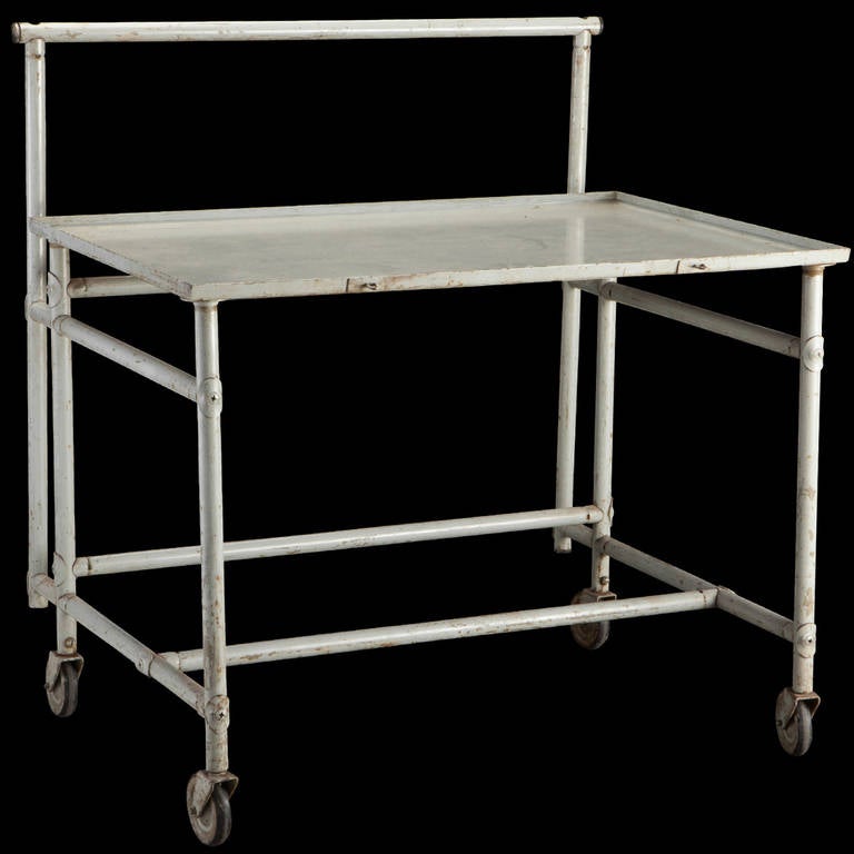 Simple metal cart / side table by Rene Herbst.

Made in France circa 1930