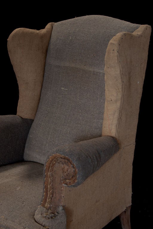 20th Century Pair of primitive tall wingback lounge chairs