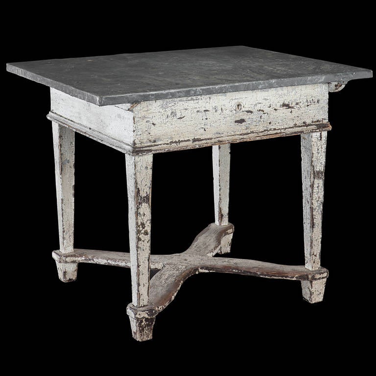 Baker's table with original white paint, and sliding zinc top meant for resting dough.

Made in Belgium circa 1800