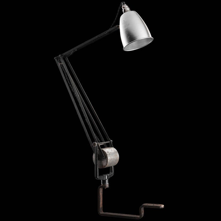 Architect's Lamp with barrel weighted counterbalance, iron bar for mounting.

Newly rewired, made in England circa 1950.