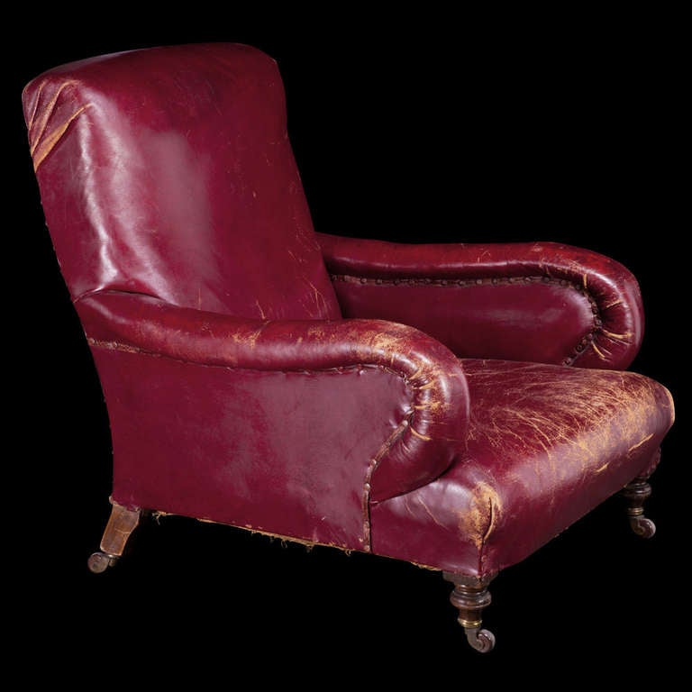 Gents red leather armchair.