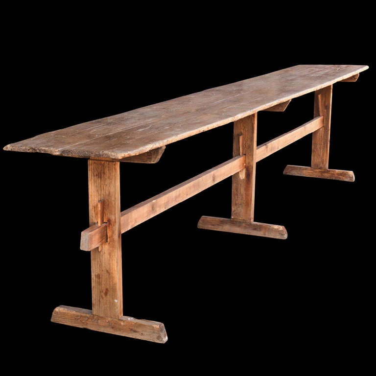 Wonderfully long table with simple stretcher