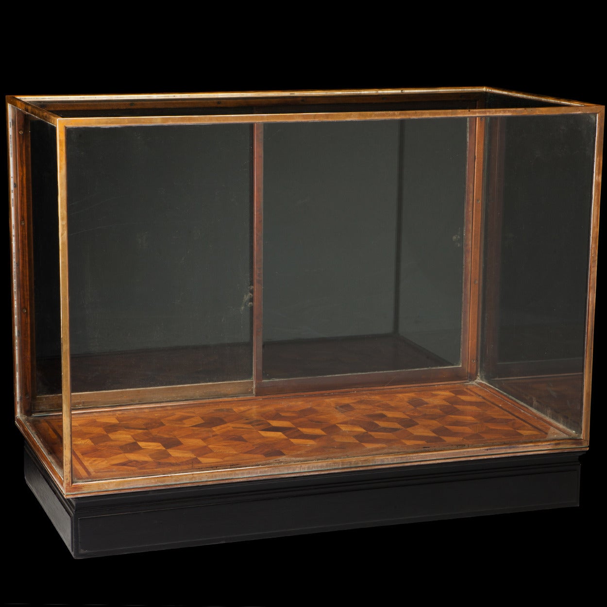 Copper frame with marquetry base, sitting atop original ebonized platform.

Made in England, circa 1920.