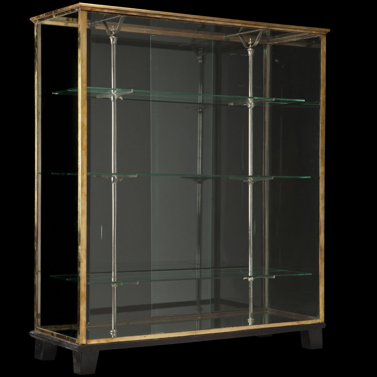 Brass display cabinet with nickel-plated fittings and ebonized base.