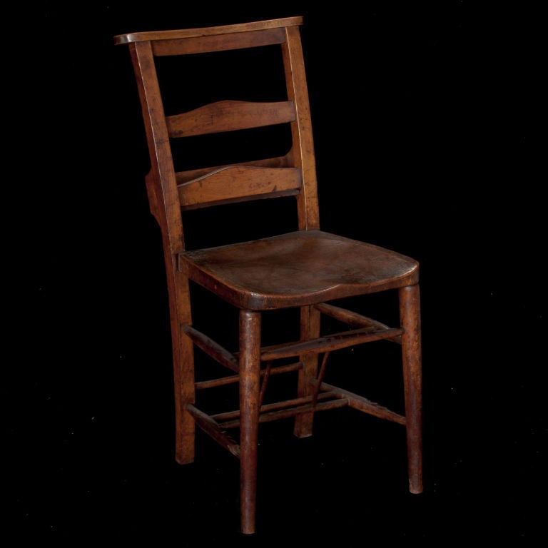 School / Library chairs with back storage for books, simple form, original worn surface.  Priced individually.
