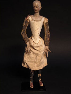 Santo/Saint carved figure with unusual painted shoes, original dress and gilded sleeves, detailed face, original paint.