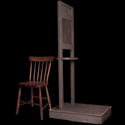 Traveling confessional, unusual piece with original painted surface, and simple chair, the base removes from the confessional wall for easy transport.