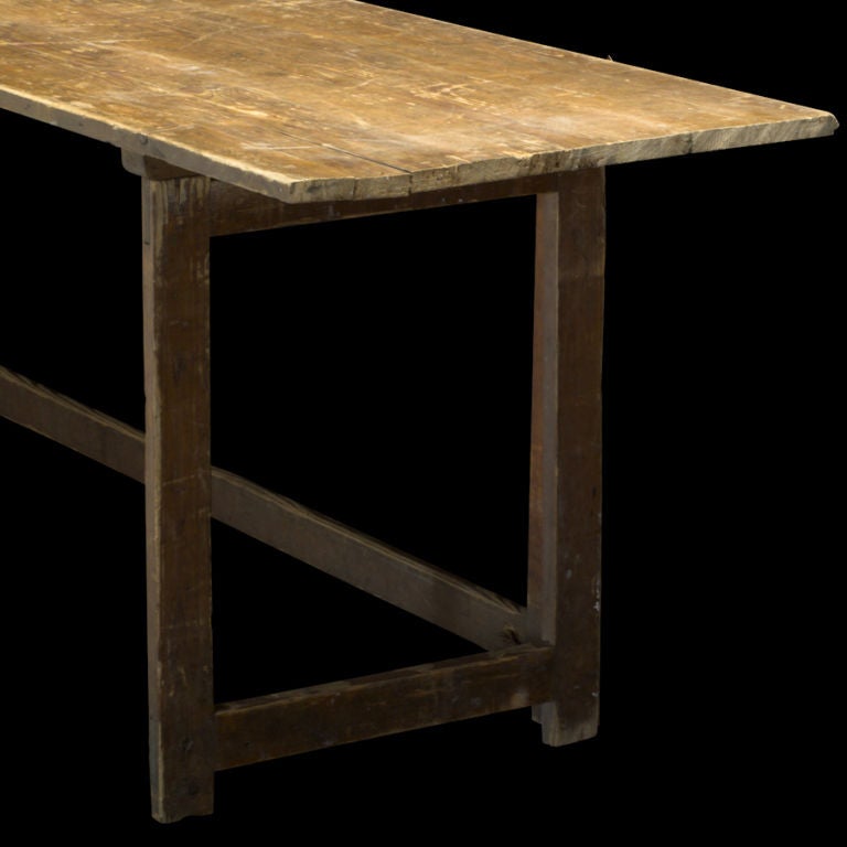 Unusual work folding table with 3/4 surround based stretchers.