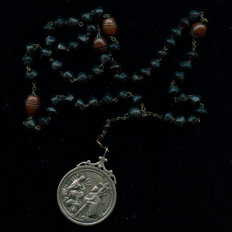 Monks Rosary with glass and wood beads medallion of pressed silver.