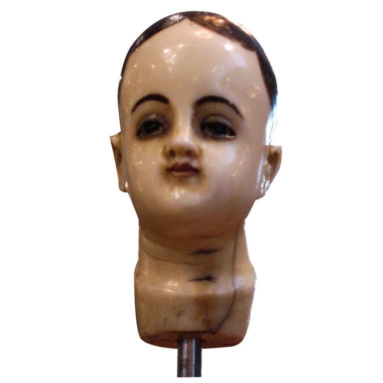 Miniature Carved Ivory Santos Head with Painted Details