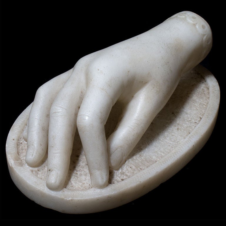 Marble hand with delicate wrist carving.