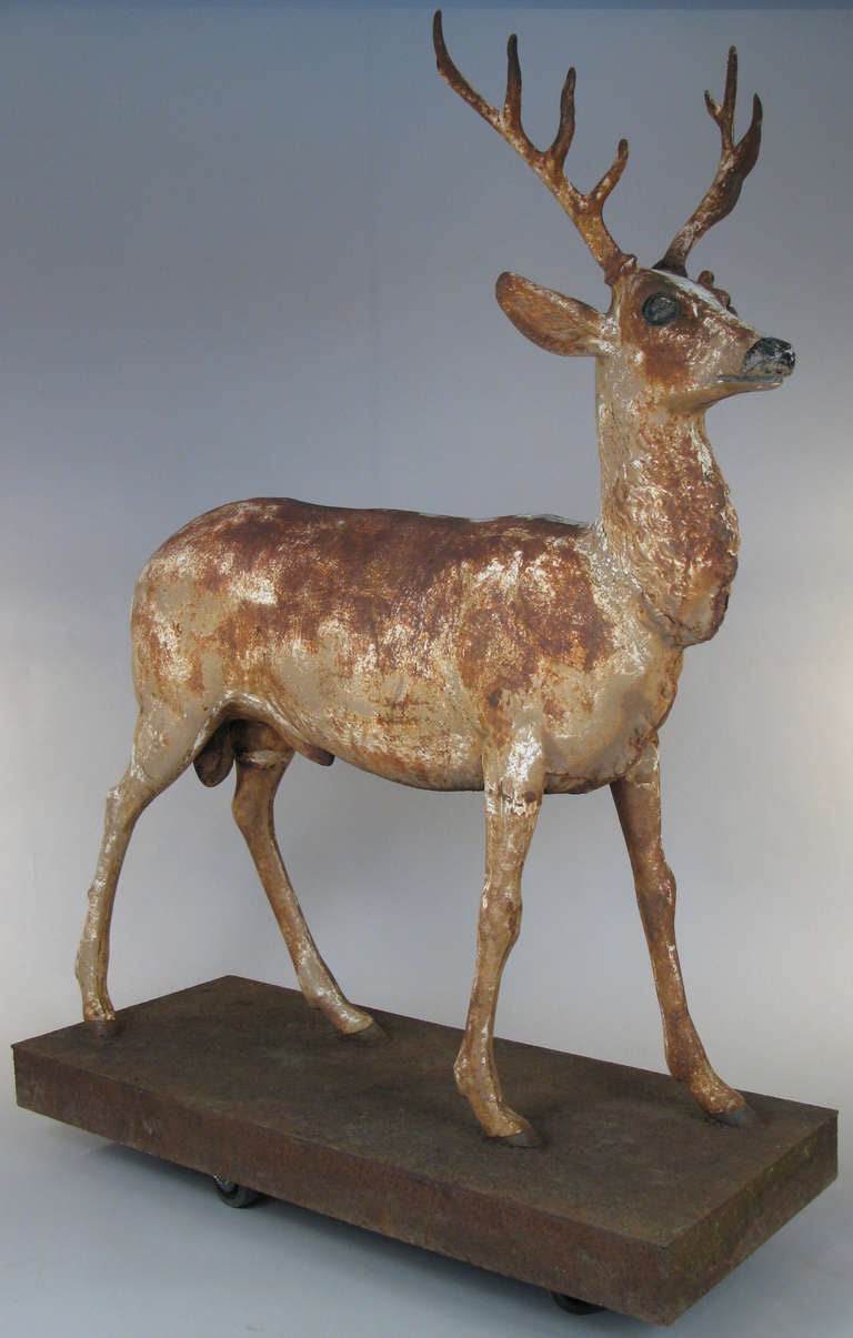 a beautiful late 19th century cast iron standing stag attributed to J.W. Fiske. beautifully detailed and great form.