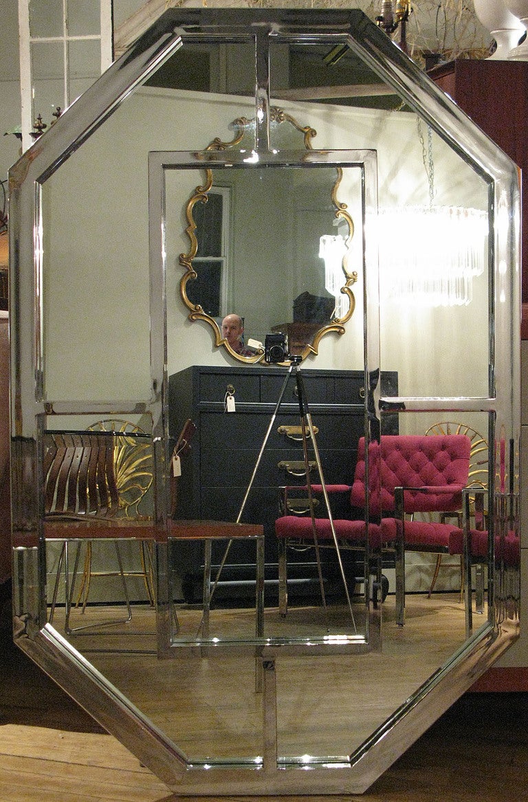 A beautiful large octagonal chromed steel mirror by Pace Collection, circa 1971. With a wide chromed steel frame and an interior rectangular chrome detail in the center of the mirror. Beautifully made.