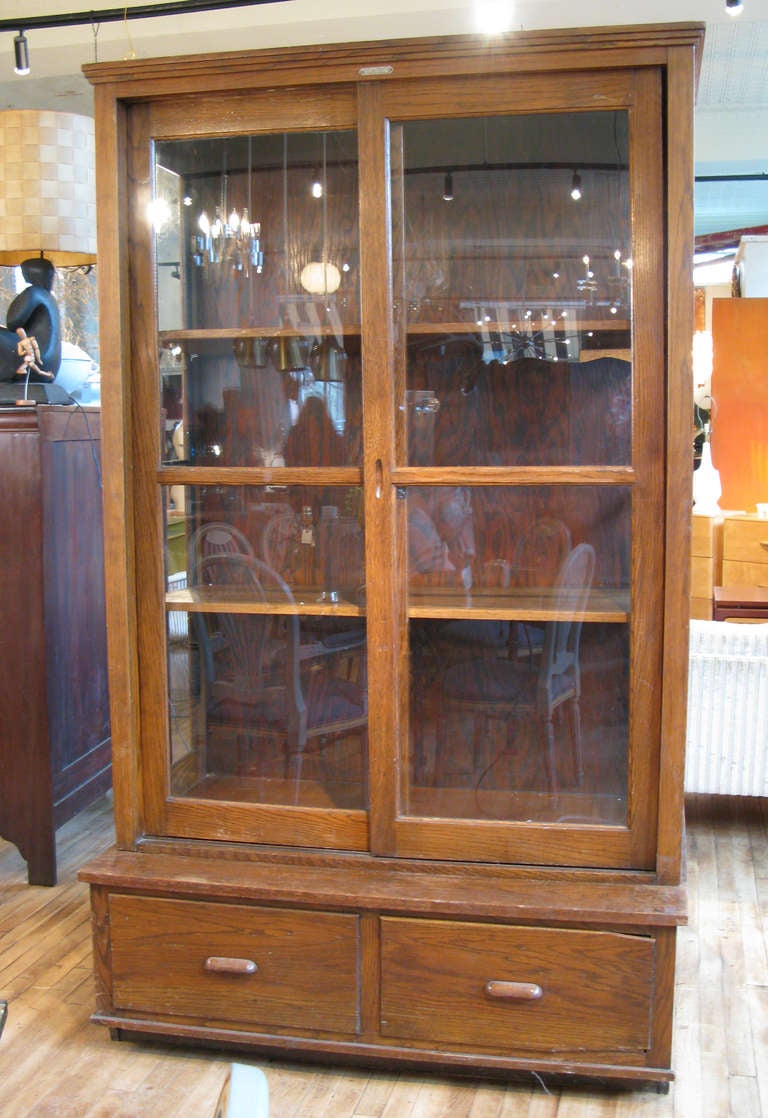 antique oak display cabinet