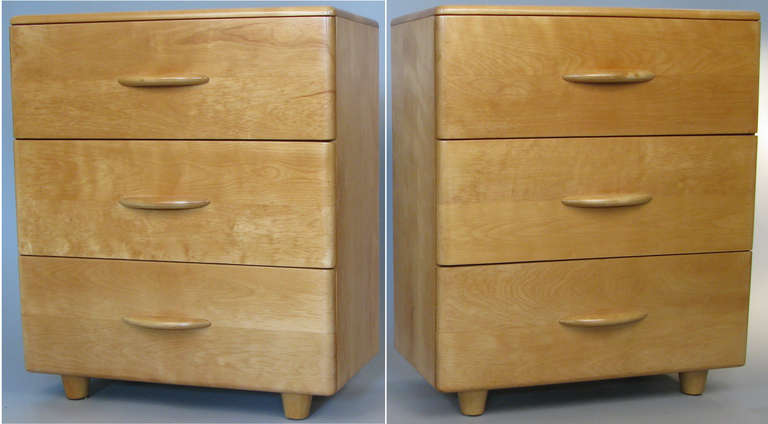 a very nice matched pair of 3 drawer 1950's modern chests in birch  by Heywood Wakefield. Nice subtle design with curved birch handles. beautifully refinished.